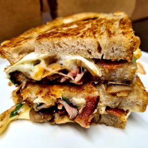 A delicious cheese and bacon toasty from Social Fabric Cafe