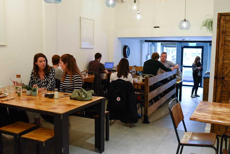 Interior of a busy day in Social Fabric Café