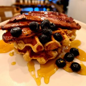 Delicious Pancake stack dripping with syrup