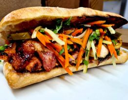 Delicious sandwich with bacon and vegetables 