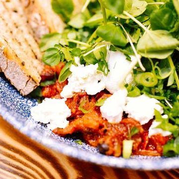 Greens, goats cheese on toast from the Social Fabric Cafe's breakfast menu